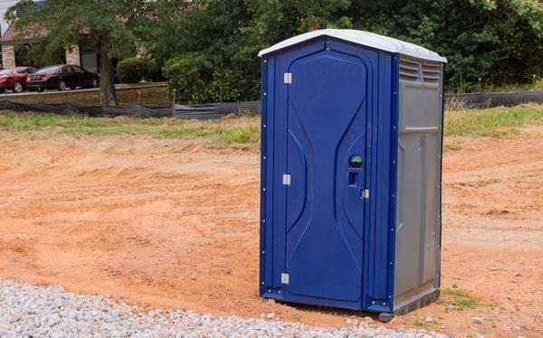 Elegant restroom setup at an outdoor wedding venue
