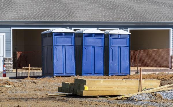 Technician responding to an emergency portable restroom service call